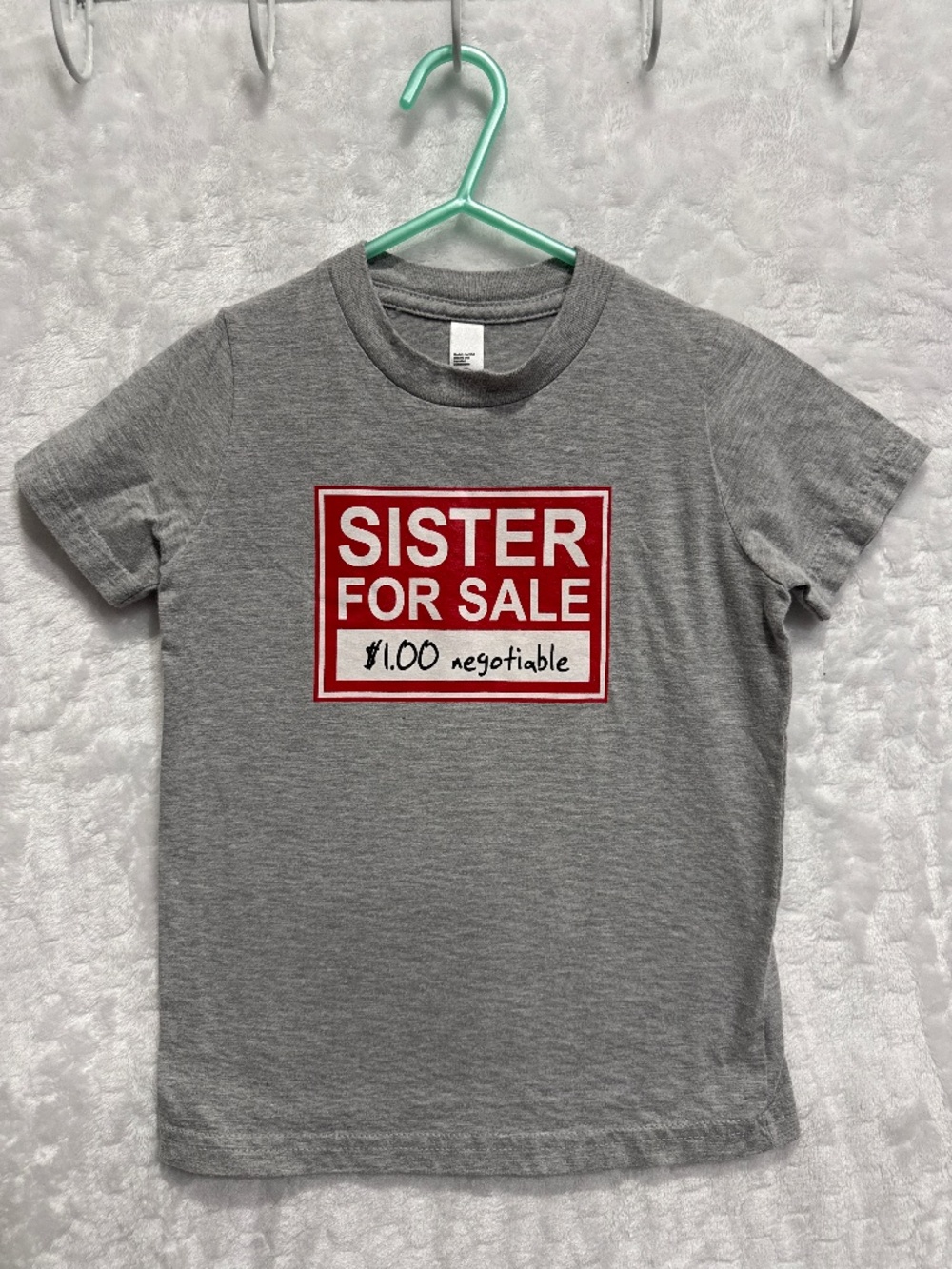 kids' t-shirt size 4 featuring a novelty graphic reads "SISTER FOR SALE $1.00”